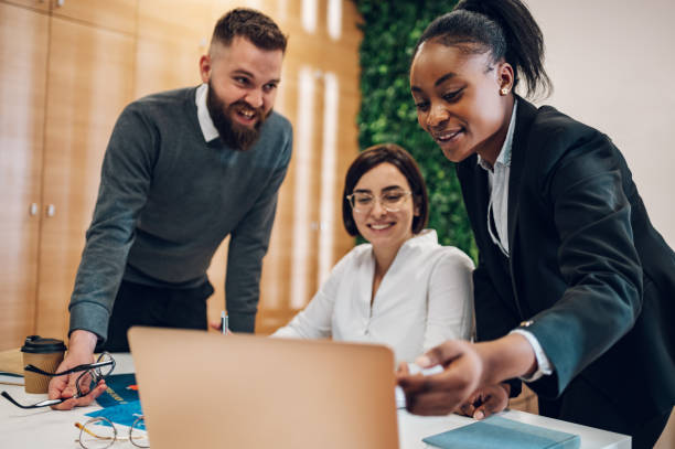 istock Multicultural team working together in office and having a meeting 1394641949