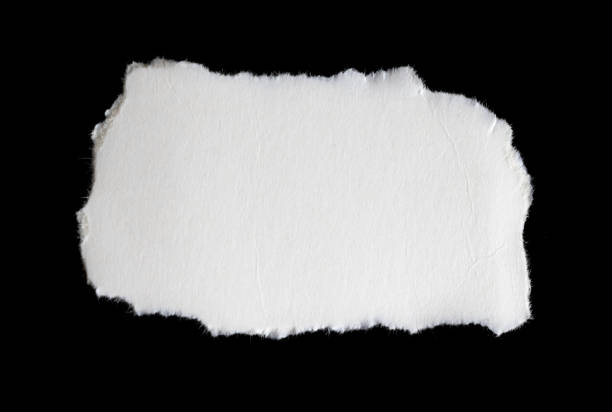 istock a white piece of paper on a black isolated background 1394642666