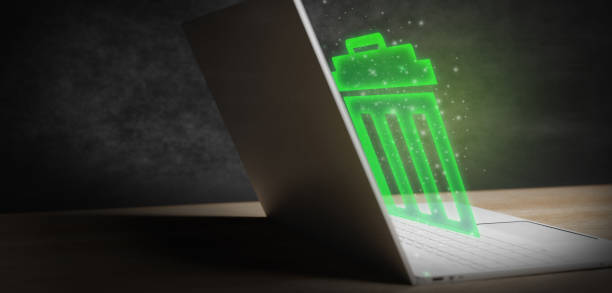 Laptop With Glowing Hologram Trash Bin Icon. Trash Can. Deleting Data. 3D Render