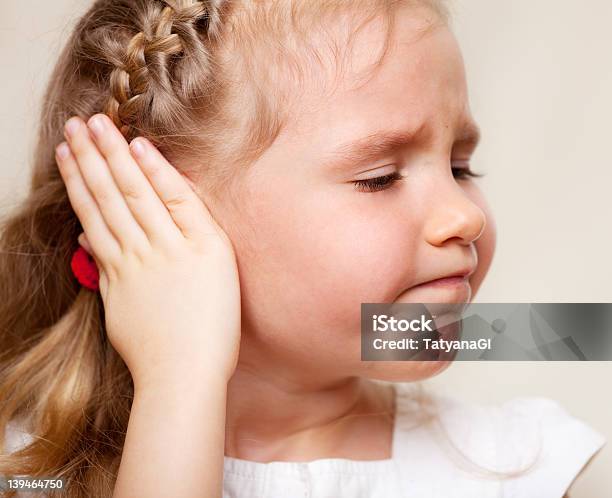 Girl Has A Sore Ear Stock Photo - Download Image Now - Child, Ear, Otitis