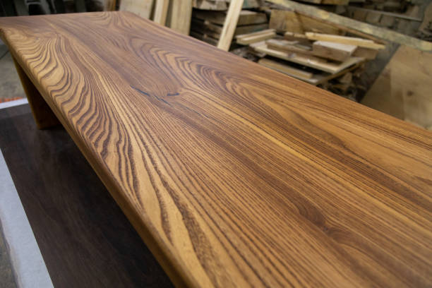 istock Newly-made brown wooden table in the workshop 1394647930