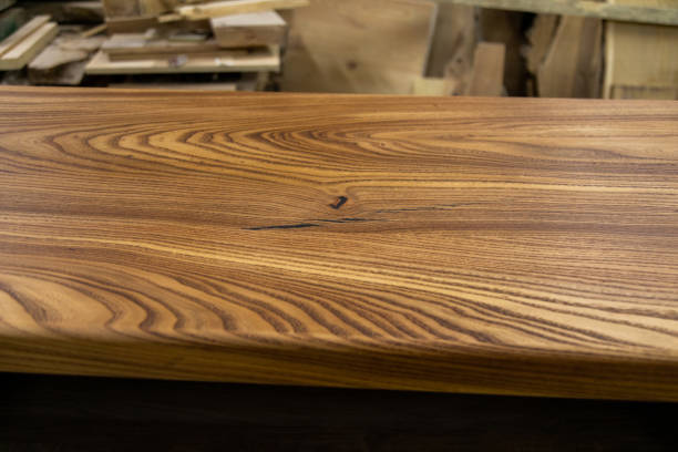 istock Newly-made brown wooden table in the workshop 1394648372