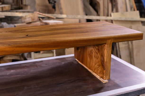istock Newly-made brown wooden table in the workshop 1394648396