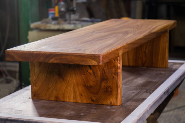 istock Newly-made brown wooden table in the workshop 1394650535