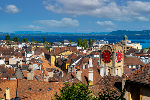 View of the old town of Neuchâtel, Lake Neuchâtel and the Alps.