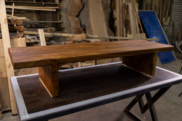 istock Newly-made brown wooden table in the workshop 1394651264