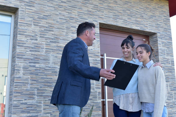 istock real estate seller showing a house 1394654090