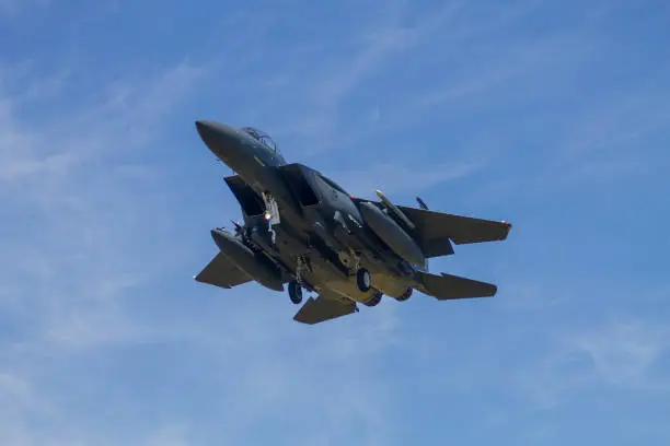 F Lakenheath F-15 on approach to land. Blue sky with few high level clouds