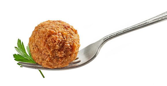 fried organic falafel ball on fork isolated on white background, halafel