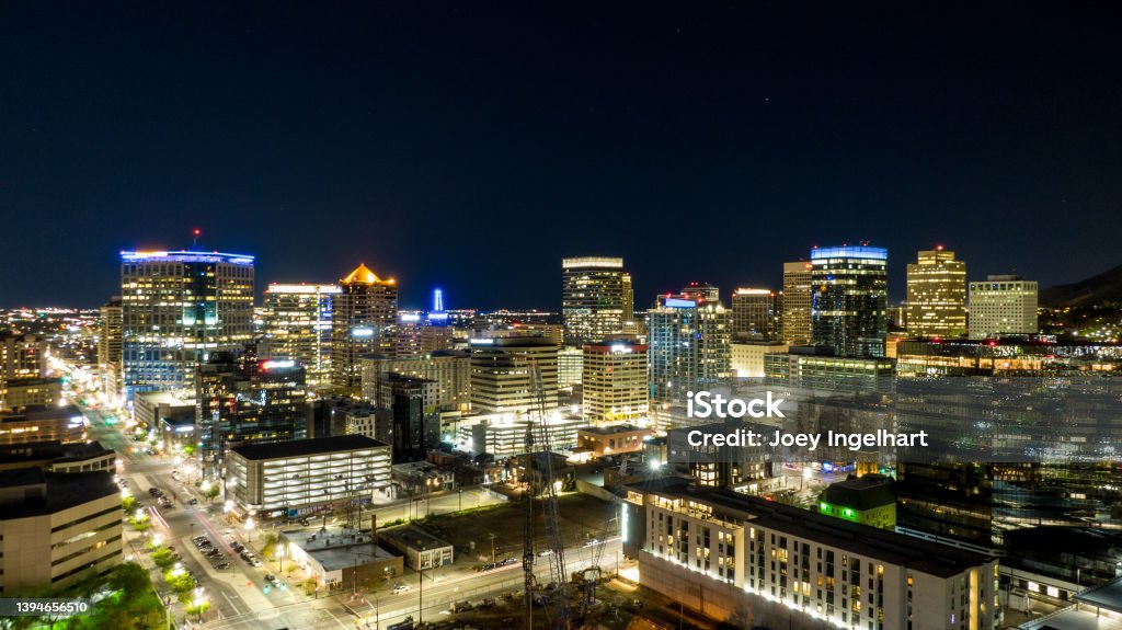Long Exposure Drone Shot of Downtown Salt Lake City Utah at Night A night time aerial view of Salt Lake City. The night time light of Salt Lake City. Night Stock Photo