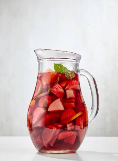 jug of red sangria jug of red sangria on white restaurant table sangria stock pictures, royalty-free photos & images