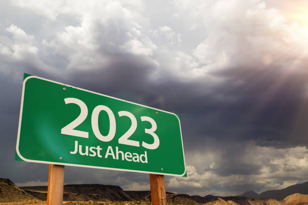 istock 2023 Green Road Sign Over Dramatic Clouds and Sky. 1394663002
