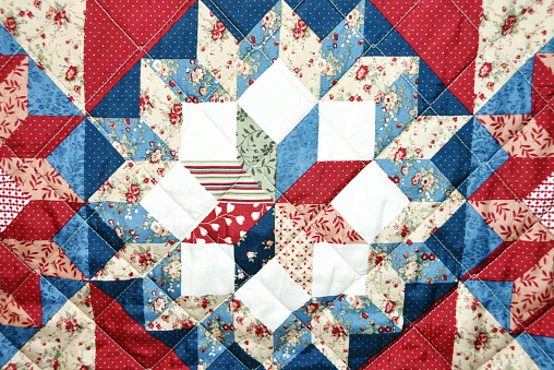 Fabric with quilted pattern.