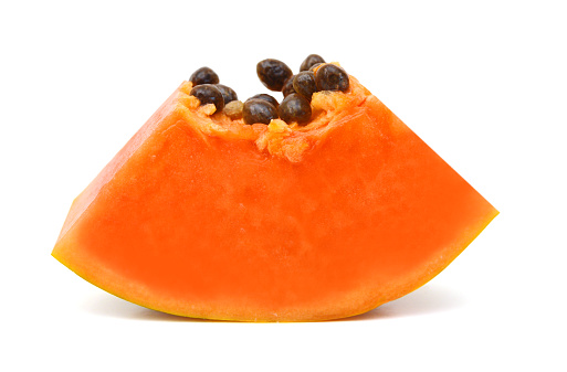 Slice of sliced melon close-up on gray background