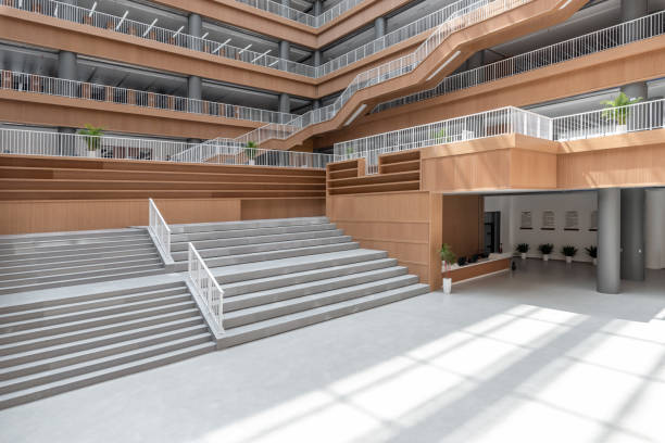 istock Stairs and passages in a large modern library 1394685925