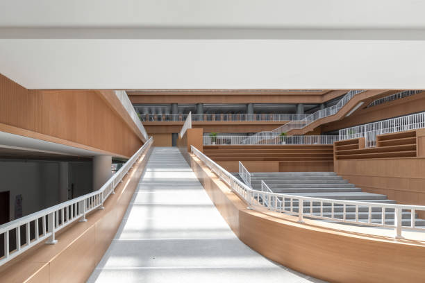 istock Stairs and passages in a large modern library 1394685936