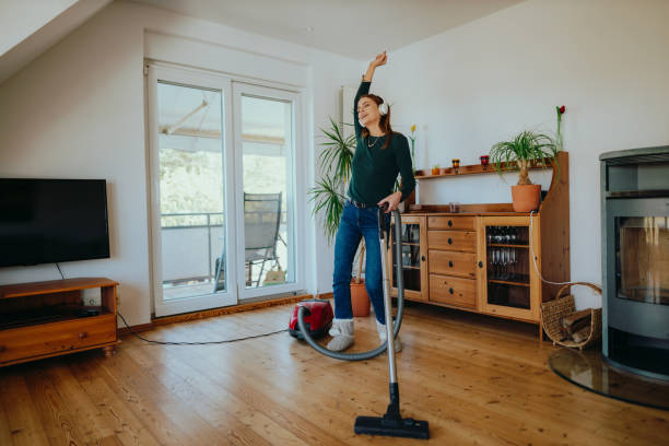 istock Dancing and vacuuming at home 1394687505