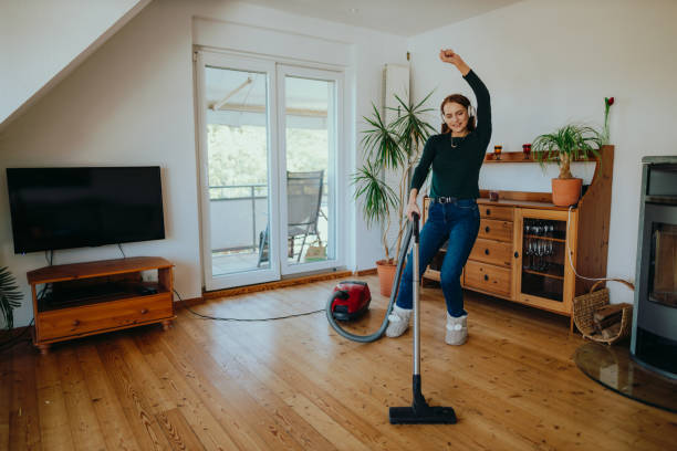 istock Dancing and vacuuming at home 1394687532