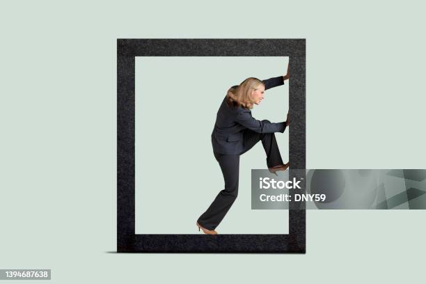 Woman Boxed In Stock Photo - Download Image Now - Trapped, Boundary, Pushing