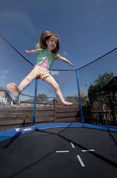 istock Young girl on trampoline 139468989