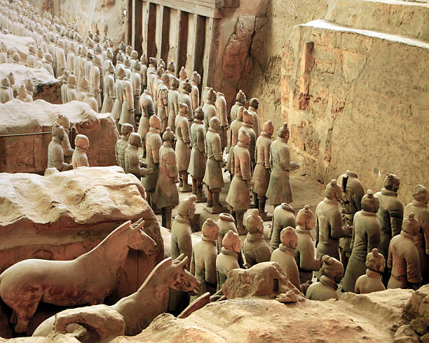 Vanguard of the Terra Cotta Army, Xian. China Vanguard of the Terra Cotta Army, Xian. China, comprised of 210 foot soldiers in three lines, followed by the cavalry qin dynasty stock pictures, royalty-free photos & images