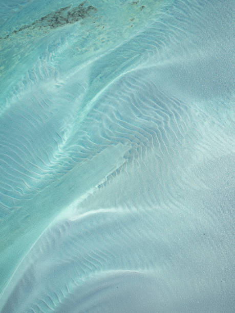 Aerial view of water and sand patterns stock photo