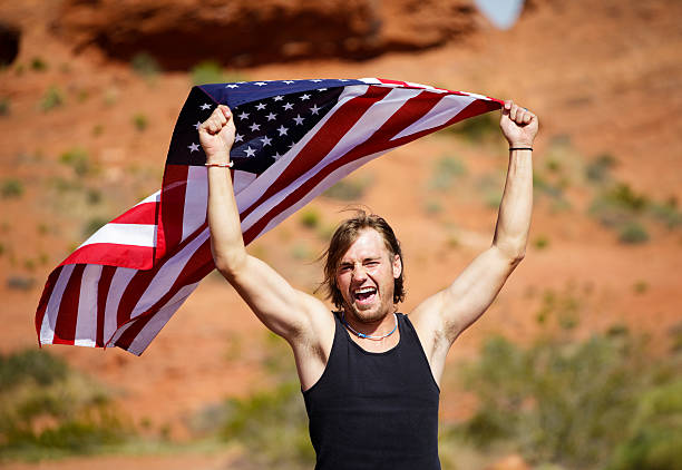 istock Young Man Holding American Flag 139469854