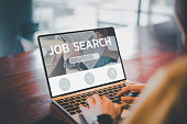 job search concept, find your career, woman looking at online website by laptop computer. People searching for vacancies or position on the internet, recruiting, finding jobs. Unemployed and poor economy