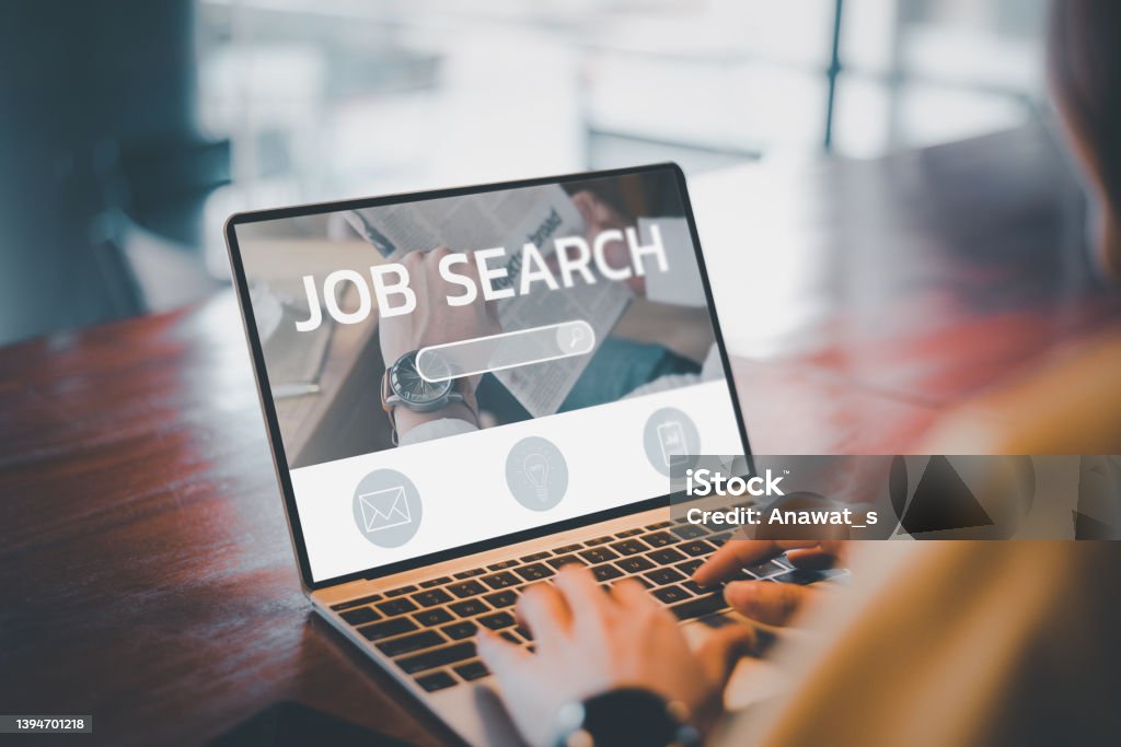 job search concept, find your career, woman looking at online website by laptop computer. People searching for vacancies or position on the internet, recruiting, finding jobs. Unemployed and poor economy Job Search Stock Photo