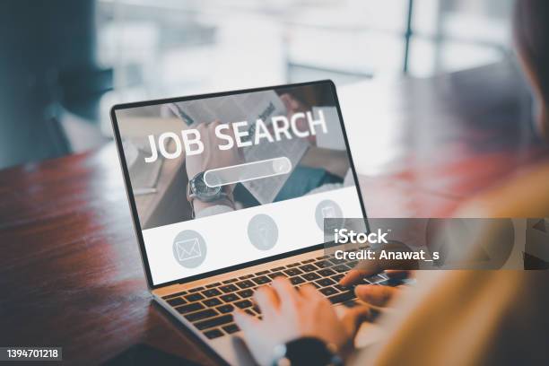Job Search Concept Find Your Career Woman Looking At Online Website By Laptop Computer People Searching For Vacancies Or Position On The Internet Recruiting Finding Jobs Unemployed And Poor Economy Stock Photo - Download Image Now