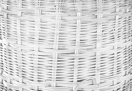 Basket woven bamboo wood wall texture crafts pattern on grey background