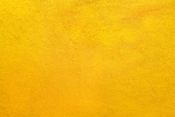 istock Abstract golden rock wall in rough seamless patterns decorative on cement background 1394704931