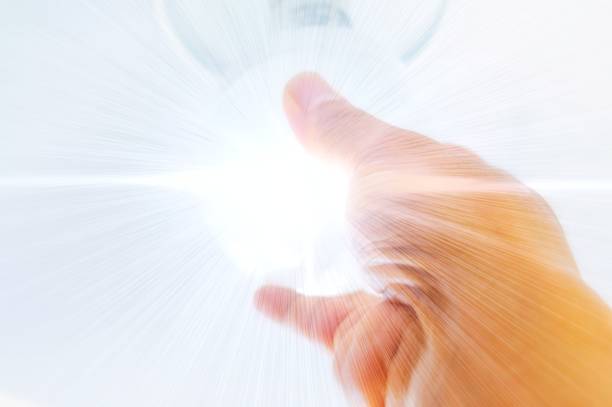 The light bulb touched by the concept of science technology shines