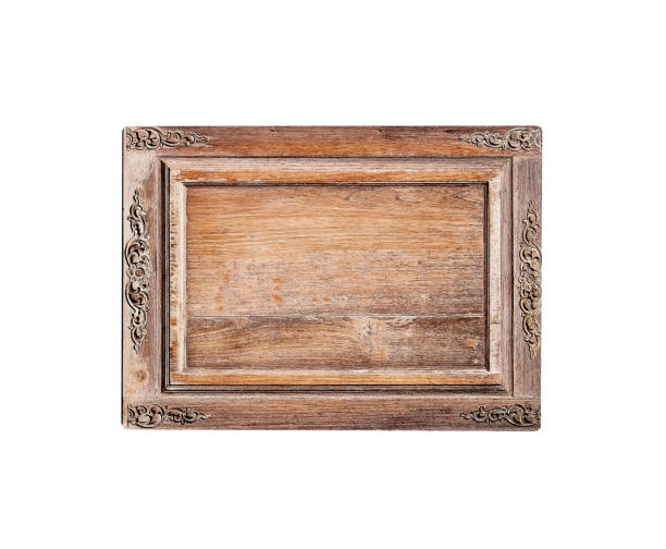 istock Wood brown frame with engraving flower patterns in edge isolated on white background , clipping path 1394706682