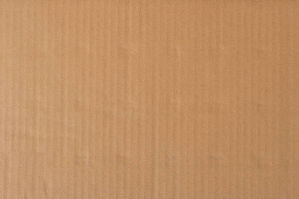 istock Old cardboard background with folds and creases. 1394706689