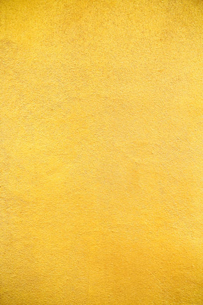 istock Gold orange wall in rough seamless patterns decorative on concrete background 1394707498