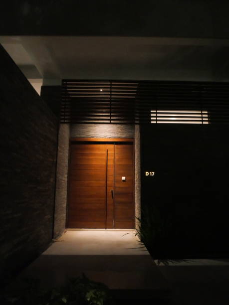istock wooden door in night 1394708229