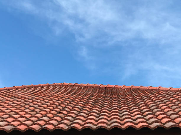 istock Old roof with blue sky 1394709910