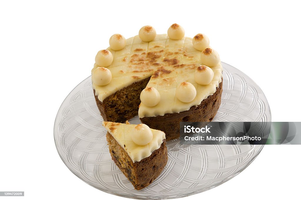 Simnel Cake Traditional British Easter cake. Simnel cake with one slice cut. Almond Stock Photo