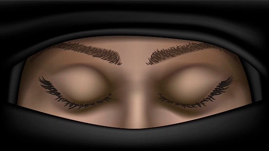Muslim woman in niqab closed eyes close up