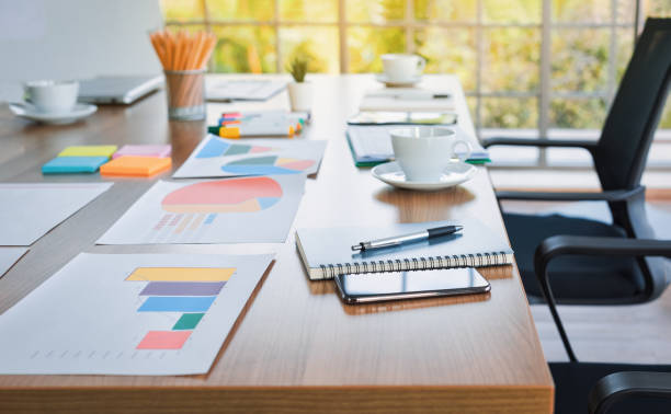 istock Creative Working Space. Office table with blank notepad and laptop. Papers and pencils in office 1394724679