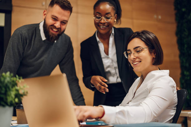 istock Multicultural team working together in office and having a meeting 1394727160
