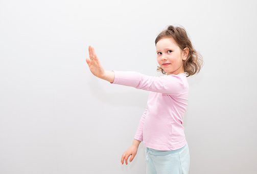 Portrait of a little girl on a white background. http://s3.amazonaws.com/drbimages/m/np.jpg