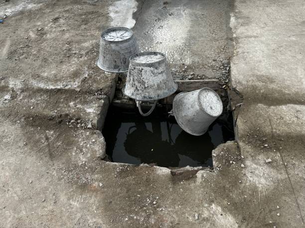 istock Sewer hole without metal grate. 1394730651