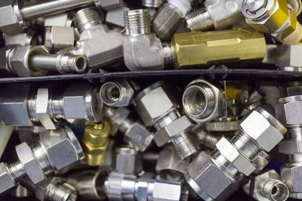 istock Quick connect fitting coupling for compressed air, hydraulics, pneumatics, gases, fuels lie in a chaotic manner in the box 1394736280
