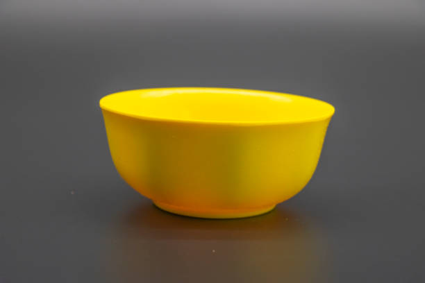 istock yellow Porcelain over on black background 1394736422