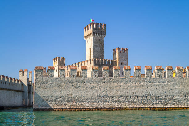 Sirmione, Italy -  March 9, 2022: The east side of the Scaliger castle seen from the Garda lake