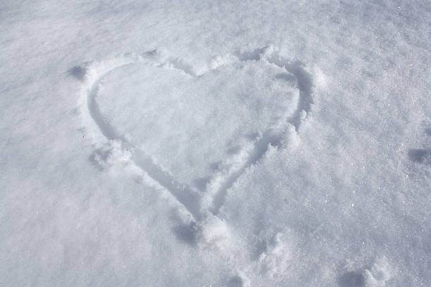 istock Heart shape in the snow 139473827