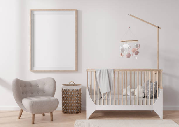 istock Empty vertical picture frame on white wall in modern child room. Mock up interior in scandinavian style. Free, copy space for your picture. Baby bed, armchair. Cozy room for kids. 3D rendering. 1394745735