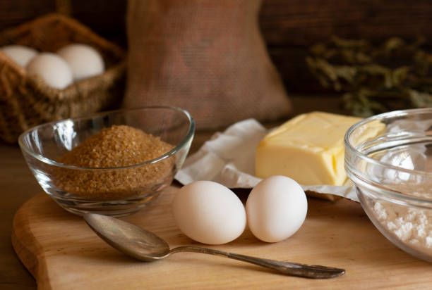 Preparation for baking - flour, one, butter in an old kitchen